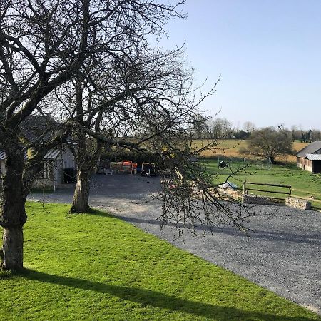 L'étable aux Gîtes du val Genneville Exterior foto